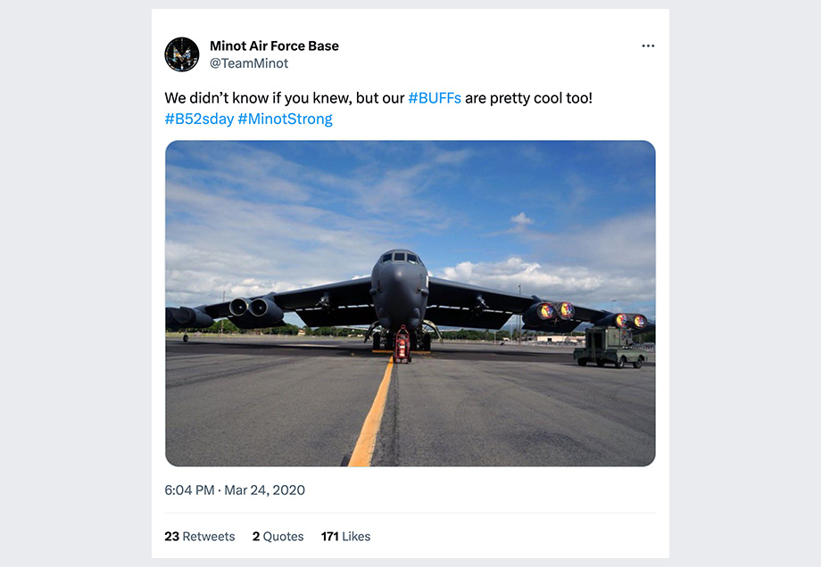 Image of a Tweet from the Minot Air Force Base that states, "We didn't know if you knew, but our #BUFFs are pretty cool too! #b52sday #MinotStrong" The image within the Tweet shows a B52 on a runway. 